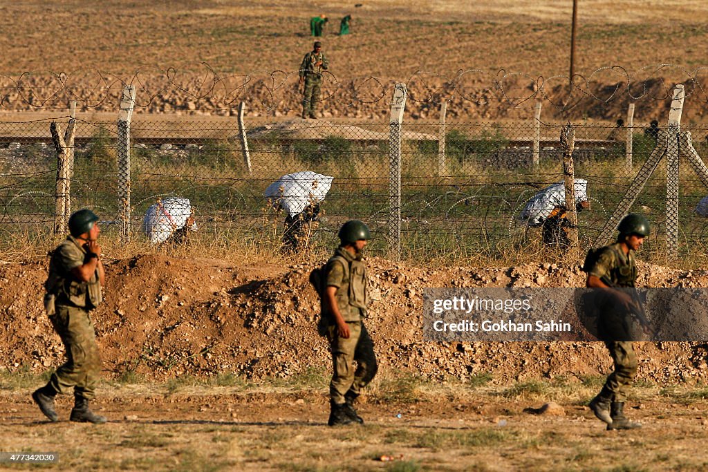 Refugees Continue To Pour Into Turkey From Syria As They Attempt To Escape IS Violence