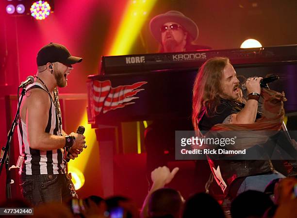 Musicians Brantley Gilbert and Johnny Van Zant perform onstage during CMT Crossroads: Lynyrd Skynyrd and Brantley Gilbert premiering Saturday June...