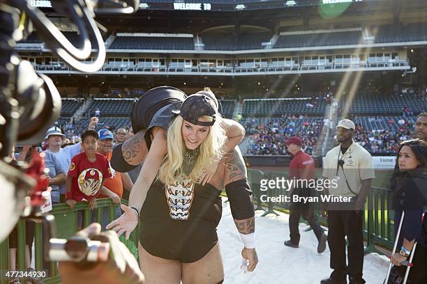Legends of Wrestling: Tyrus carrying out Ashley Massaro out of stadium after losing match vs Brian Myers at Citi Field. Flushing, NY 6/7/2015 CREDIT:...