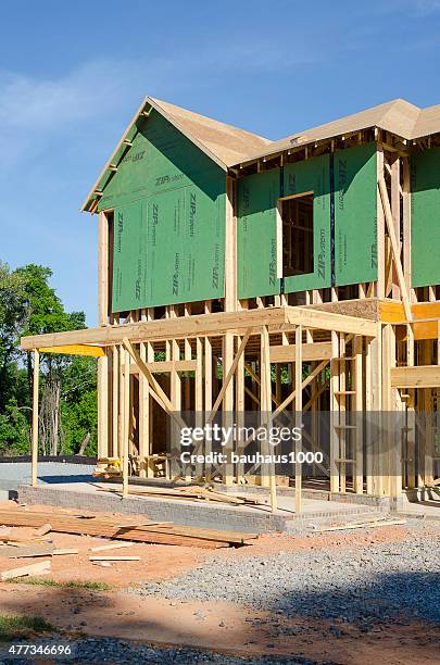 new home under construction - timber window frames stock pictures, royalty-free photos & images