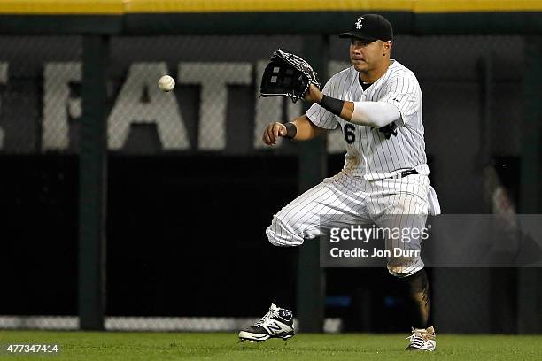 Avisail Garcia of the Chicago White Sox fields the ball against the Cincinnati Reds during the ninth inning at U.S. Cellular Field on June 10, 2015...