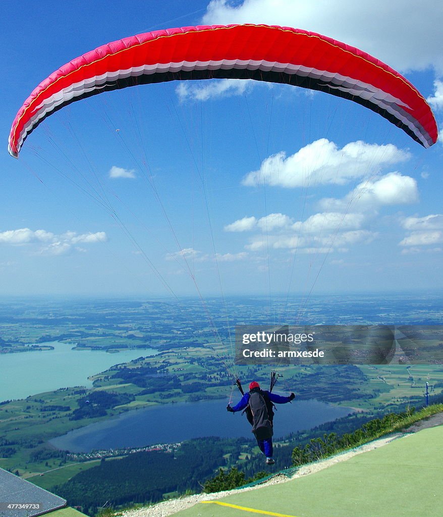 Walking in the air: paraglider leaving ground