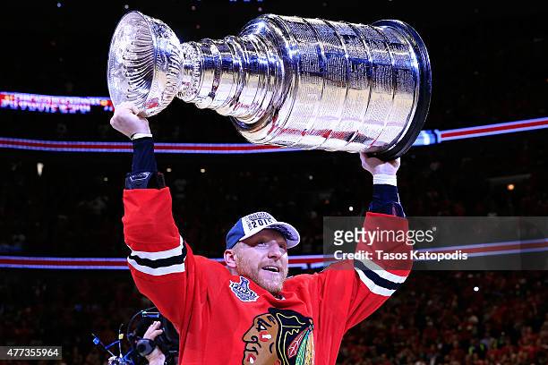 Marian Hossa of the Chicago Blackhawks celebrates with the Stanley Cup after defeating the Tampa Bay Lightning by a score of 2-0 in Game Six to win...