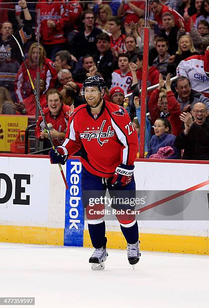 Karl Alzner of the Washington Capitals celebrates after scoring a third period goal during the Capitals 3-2 win over the Phoenix Coyotes at Verizon...