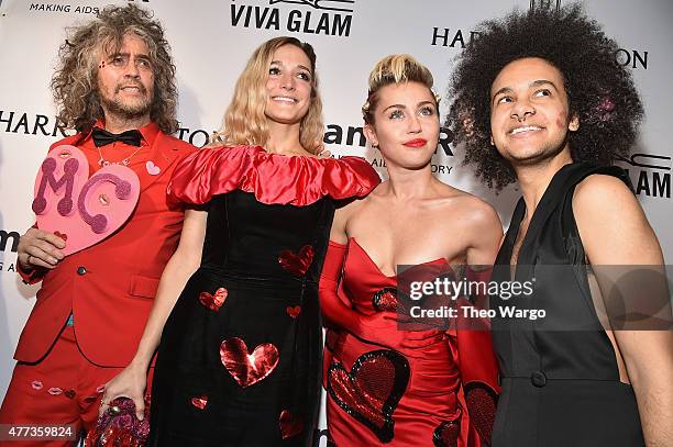 Wayne Coyne, Katy Weaver, Miley Cyrus and Tyler Ford attend the 2015 amfAR Inspiration Gala New York at Spring Studios on June 16, 2015 in New York...