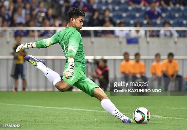 Singapore's goalkeeper Mohamad Izwan Bin Mahbud kicks the ball during the second round Group E 2018 World Cup Asian qualifier football match against...