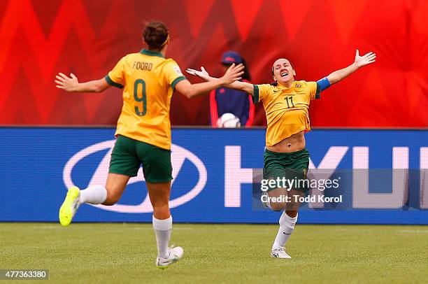 Lisa De Vanna celebrates her goal with teammate Caitlin Foord of Australia during the FIFA Women's World Cup Canada Group D match between Australia...