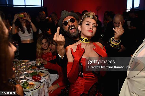 Mr. Brainwash and Miley Cyrus attend the 2015 amfAR Inspiration Gala New York at Spring Studios on June 16, 2015 in New York City.