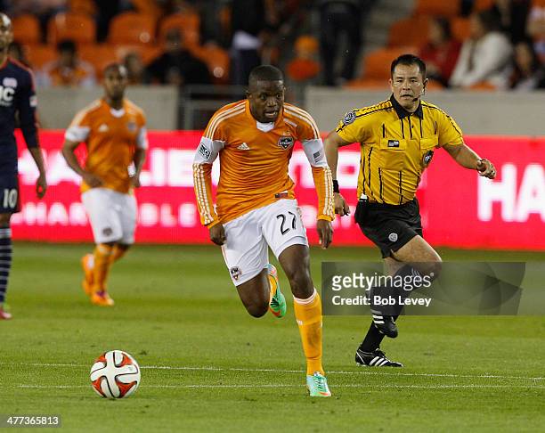 Boniek Garcia of Houston Dynamo rushes the ball up the pitch at BBVA Compass Stadium on March 8, 2014 in Houston, Texas.