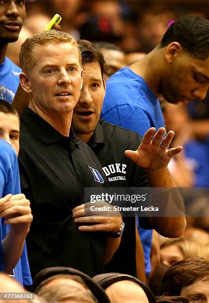 Head coach of the Dallas Cowboys, Jason Garrett and Tony Romo watch on during the game between the North Carolina Tar Heels and Duke Blue Devils at...