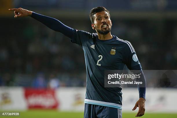 Ezequiel Garay of Argentina signals during the 2015 Copa America Chile Group B match between Argentina and Uruguay at La Portada Stadium on June 16,...