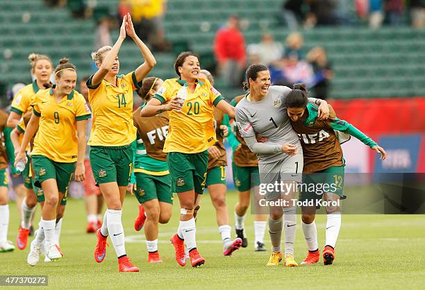 Caitlin Foord, Alanna Kennedy, Samantha Kerr, Lydia Williams and Leena Khamis of Australia celebrate after a 1-1 game with Sweden during the FIFA...