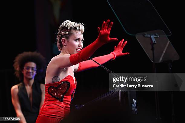 Miley Cyrus speaks onstage at the 2015 amfAR Inspiration Gala New York at Spring Studios on June 16, 2015 in New York City.