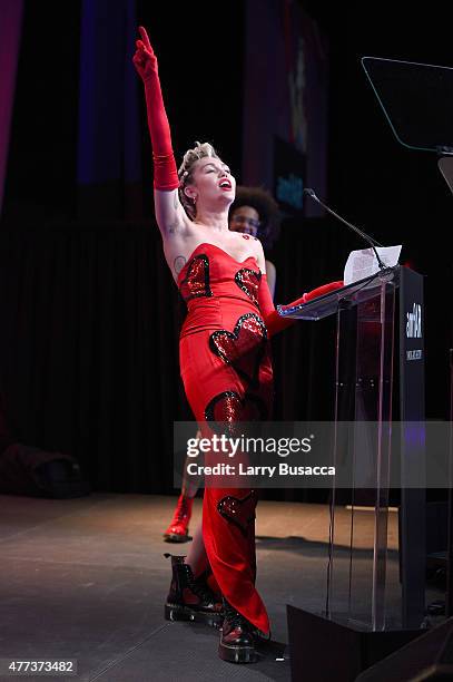 Miley Cyrus speaks onstage at the 2015 amfAR Inspiration Gala New York at Spring Studios on June 16, 2015 in New York City.