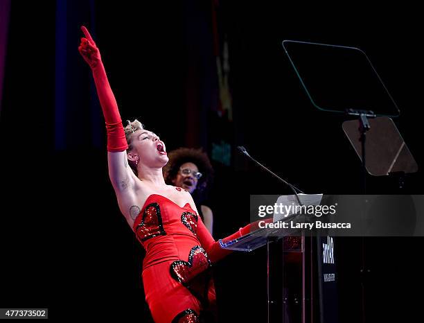 Miley Cyrus speaks onstage at the 2015 amfAR Inspiration Gala New York at Spring Studios on June 16, 2015 in New York City.