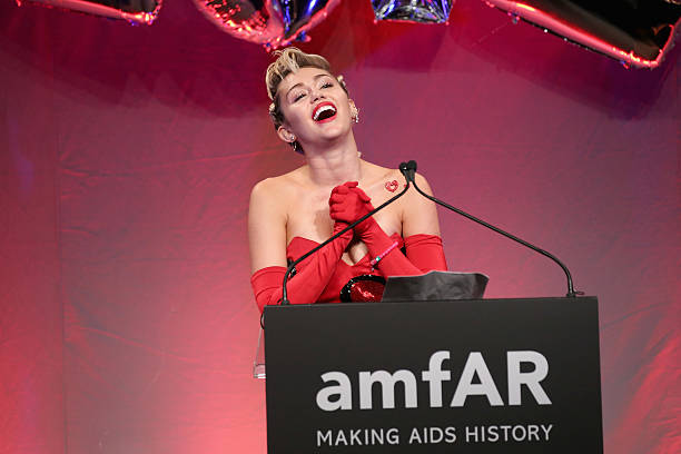 Miley Cyrus speaks onstage at the 2015 amfAR Inspiration Gala New York at Spring Studios on June 16, 2015 in New York City.