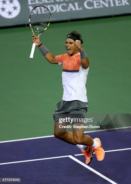 Rafael Nadal of Spain celebrates after winning match point against Radek Stepanek of the Czech Republic during the BNP Paribas Open at Indian Wells...