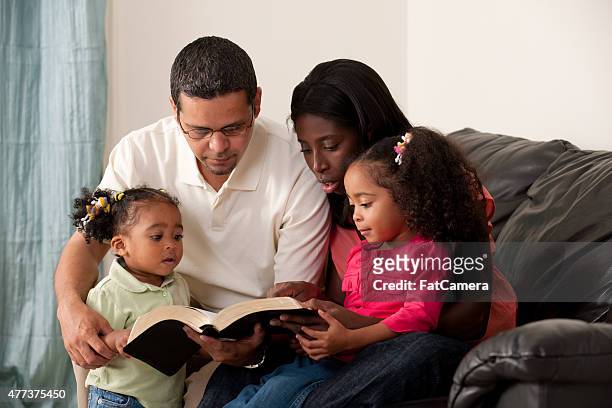 mixed family - couple praying stock pictures, royalty-free photos & images