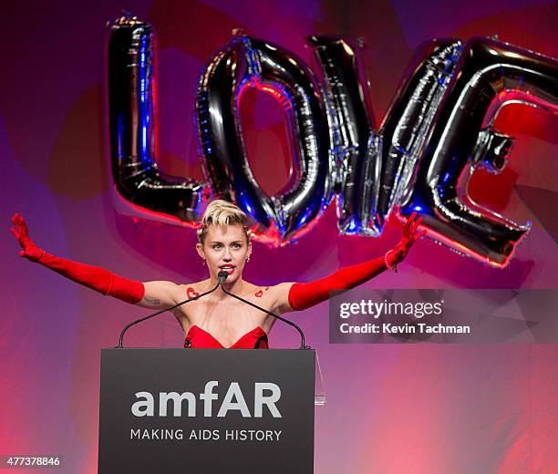 Miley Cyrus speaks onstage during the 2015 amfAR Inspiration Gala New York at Spring Studios on June 16, 2015 in New York City.