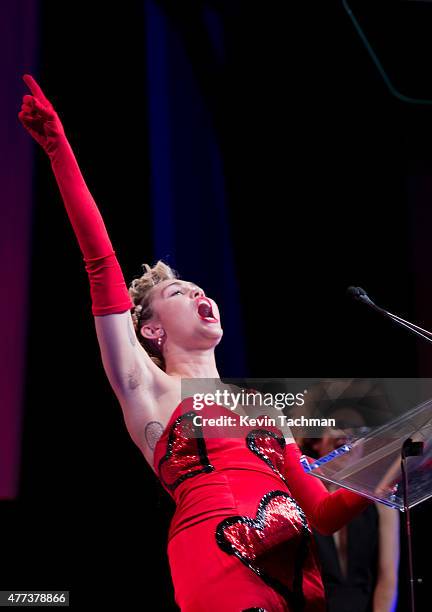 Miley Cyrus speaks onstage during the 2015 amfAR Inspiration Gala New York at Spring Studios on June 16, 2015 in New York City.