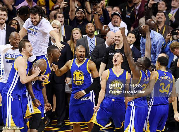 The Golden State Warriors celebrate their 105 to 97 win over the Cleveland Cavaliers in Game Six of the 2015 NBA Finals at Quicken Loans Arena on...