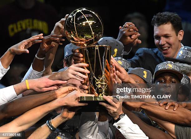 Golden State Warriors celebrate after defeating the Cleveland Cavaliers in Game 6 to win the 2015 NBA Finals on June 16, 2015 at the Quicken Loans...