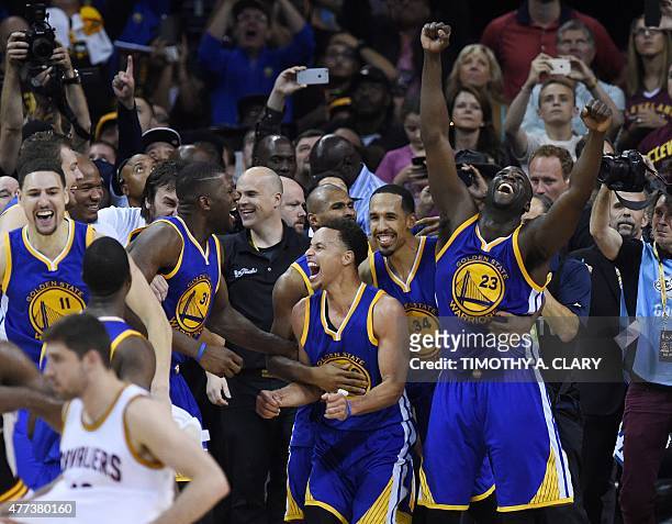 The Golden State Warriors celebrate after defeating the Cleveland Cavaliers in Game 6 to win the 2015 NBA Finals on June 16, 2015 at the Quicken...