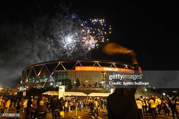 Golden State Warriors fans celebrate their team's 2015 NBA Finals win in front of Oracle Arena on June 16, 2015 in Oakland, California. This is the...