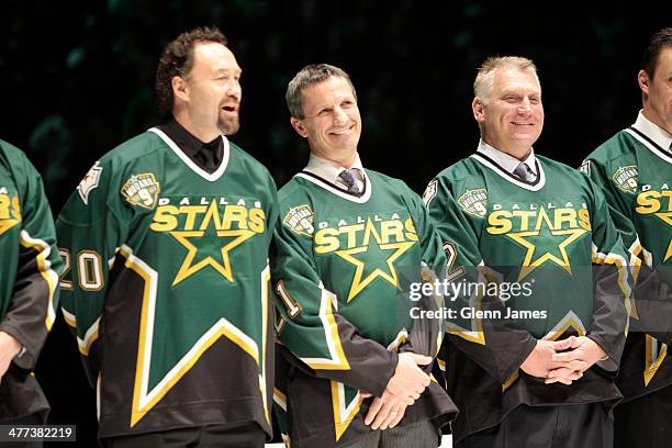 Former Dallas Stars Ed Belfour, Guy Carbonneau and Brett Hull were present to see their teammate, Mike Modano's be retired prior to a game against...