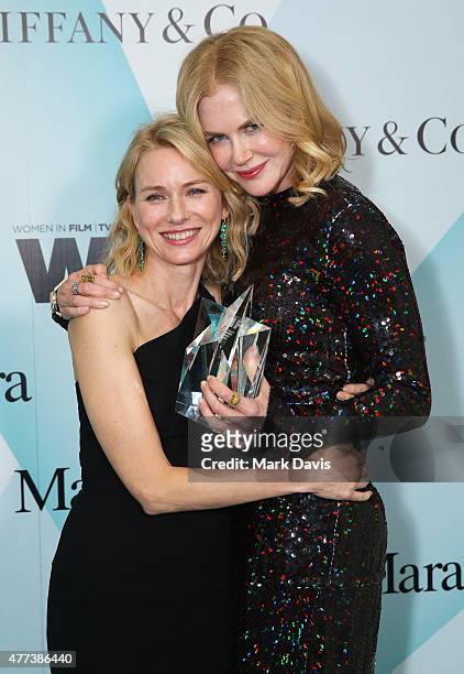Actress Naomi Watts and honoree Nicole Kidman, recipient of The Crystal Award for Excellence in Film, pose backstage at the Women In Film 2015...
