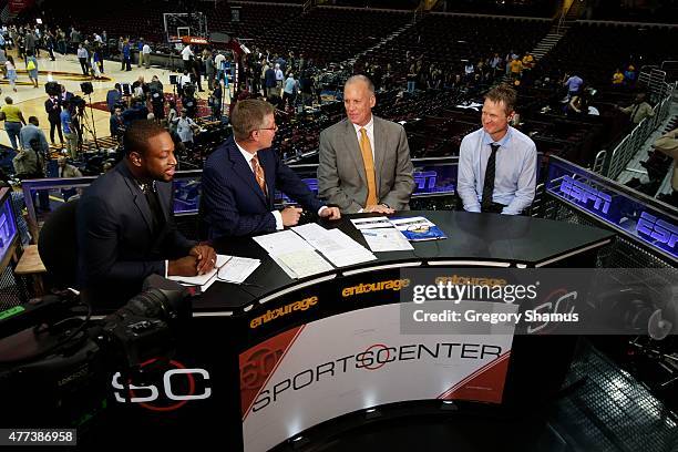 Dwyane Wade of the Miami Heat, John Anderson, Doug Collins and Golden State Warriors head coach, Steve Kerr speak after Golden State Warriors win the...