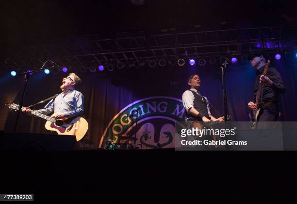 Dave King , Bob Schmidt and Dennis Casey of Flogging Molly perform on stage at Aragon Ballroom on March 8, 2014 in Chicago, Illinois.