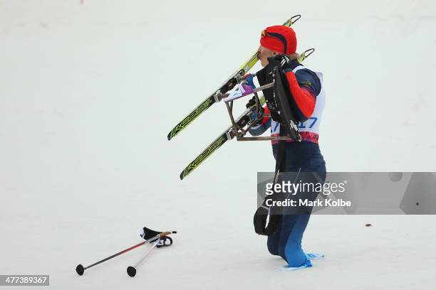 Bronze melalist Aleksandr Davidovich of Russia kiss his ski after finishing the men's 15km sitting cross-country skiing during day two of Sochi 2014...