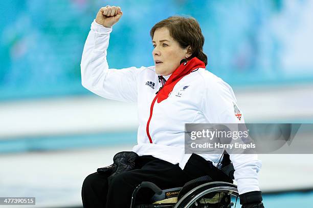 Aileen Neilson of Great Britain celebrates winning the wheelchair curling mixed round robin match between Great Britain and Sweden at the Ice Cube...