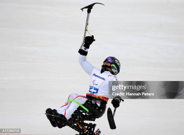 Taiki Morii of Japan reacts after finishing iin the Men's Super G Sitting Skiing during day two of Sochi 2014 Paralympic Winter Games at Rosa Khutor...