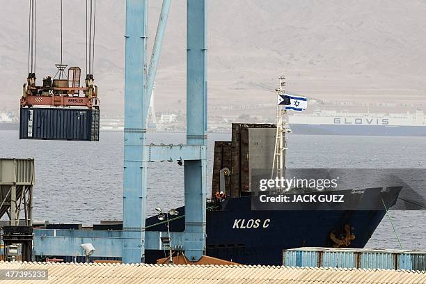 Container is removed from the Panamanian-flagged Klos-C, that was allegedly transporting arm from Iran to Gaza, on March 9, 2014 at the southern...