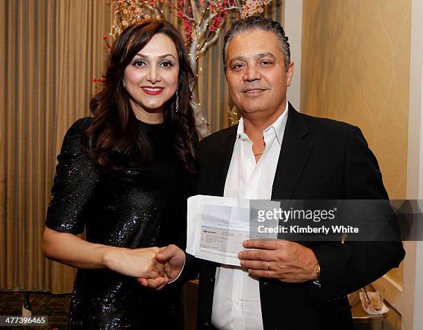 Bit Daryabari and Mathew Zaheri pose for a photograph at the PARS Equality Center 4th Annual Nowruz Gala at Marriott Waterfront Burlingame Hotel on...