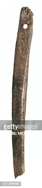 Bone needle made, with the minimum amount of working, from a pig fibula with cancellous tissue visible at the top, late 8th to mid 9th century; from...