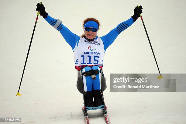 Francesca Porcellato of Italy celebrates after finishing the Women's 12km Sitting Cross-Country Skiing event during day two of Sochi 2014 Paralympic...