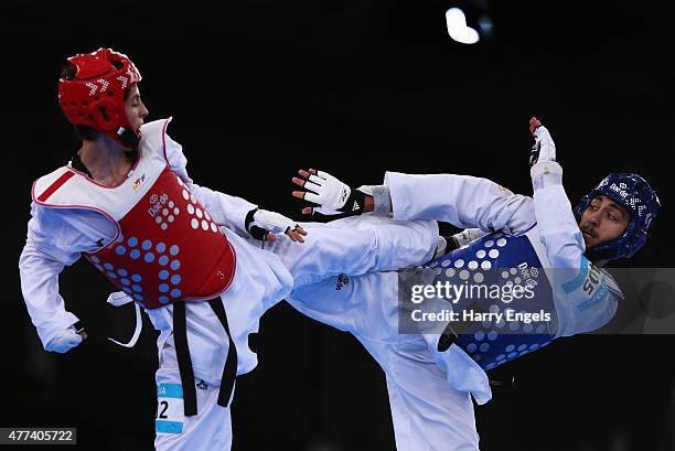 Ioannis Pilavakis of Cyprus and Mario Silva of Portugal compete in the Men's Taekwondo -68kg Preliminary round during day five of the Baku 2015...