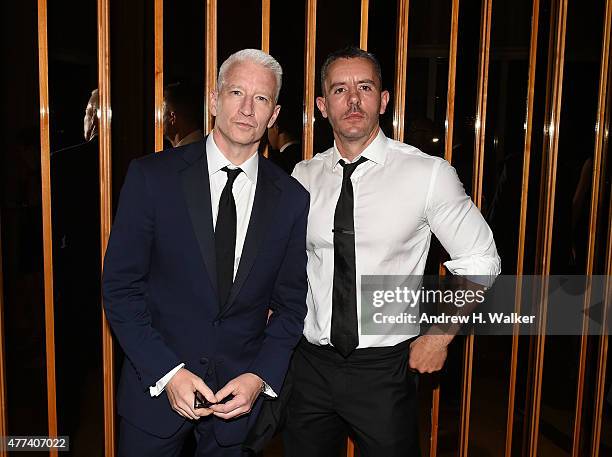 Anderson Cooper and Benjamin Maisani attend the 2015 amfAR Inspiration Gala New York after party at Boom Boom Room on June 16, 2015 in New York City.