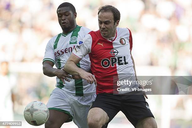 Groningen speler Genero Zeefuik, Feyenoord speler Joris Mathijsen, during the Dutch Eredivisie match between FC Groningen and Feyenoord Rotterdam at...