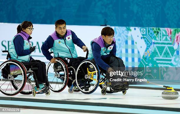 Soon-Seok Seo of the Republic of Korea competes during the wheelchair curling mixed round robin match between Great Britain and the Republic of Korea...