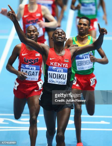 Caleb Mwangangi Ndiku of Kenya celebrates winning the gold medal in the Men's 3000m Final during day three of the IAAF World Indoor Championships at...