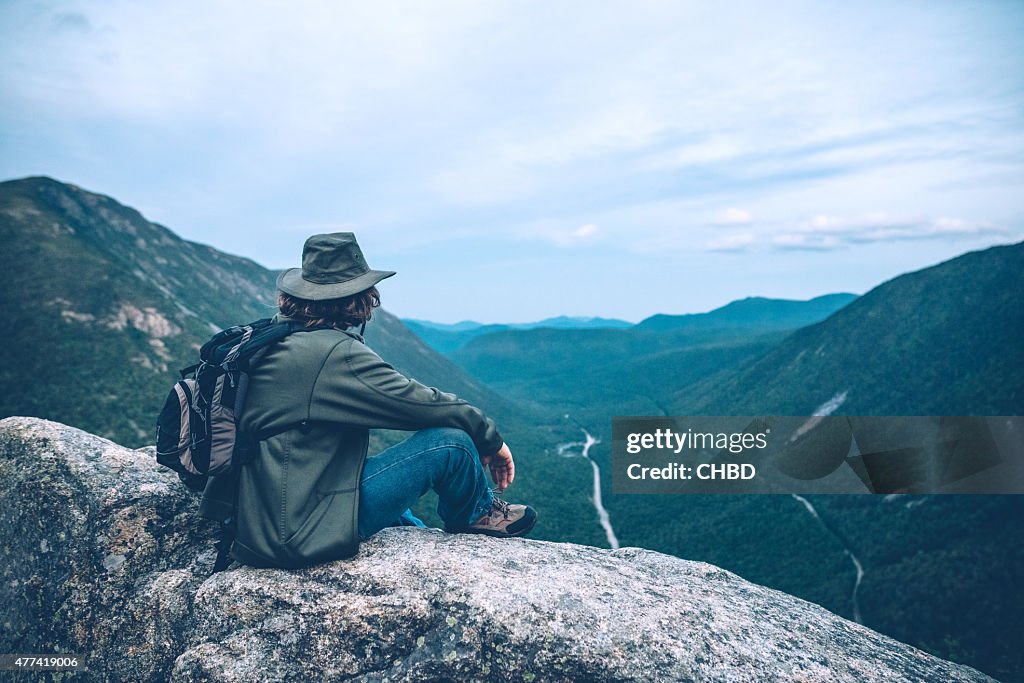 Man overlooking Crawford Notch in New Hampshire