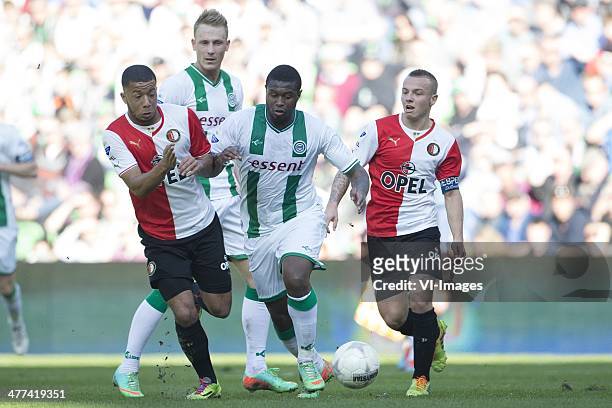 Feyenoord speler Tonny Vilhena, FC Groningen speler Genero Zeefuik, Feyenoord speler Jordy Clasie, during the Dutch Eredivisie match between FC...