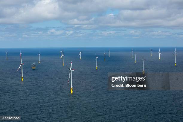 Wind turbines stand in the North Sea as installation and construction continues at Amrumbank West off-shore wind park, operated by E.ON SE, off the...