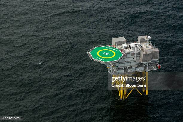 Helipad sits on top of a transformer sub station in the North Sea as installation and construction continues at Amrumbank West off-shore wind park,...