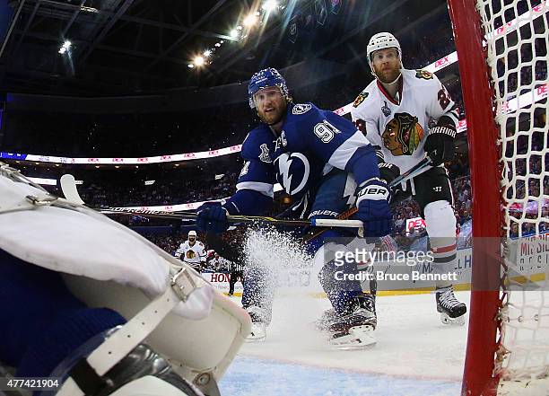 Steven Stamkos of the Tampa Bay Lightning skates against Kris Versteeg of the Chicago Blackhawks during Game Five of the 2015 NHL Stanley Cup Final...