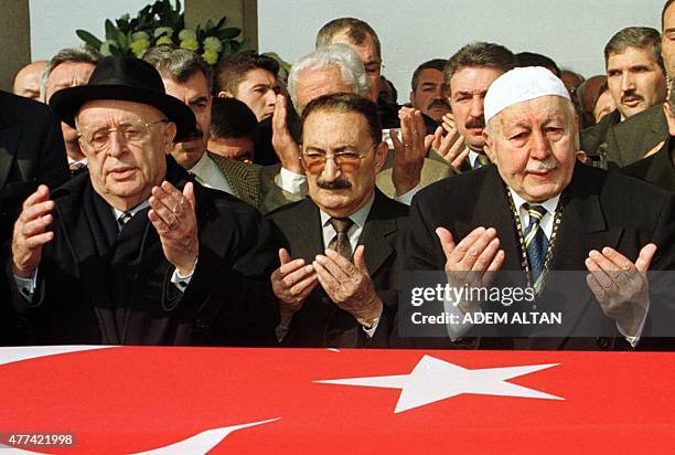 This photo taken on February 8, 2002 in Ankara shows Turkey's former President Suleyman Demirel, Turkey's former Prime minister Bulent Ecevit and...